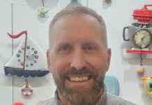 A new face at Enesco Carl Holmes, Enesco